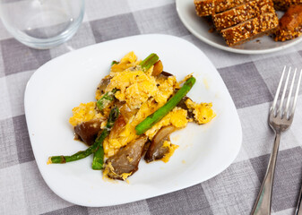 Sticker - Scrambled eggs with forest mushrooms and asparagus on plate, healthy breakfast