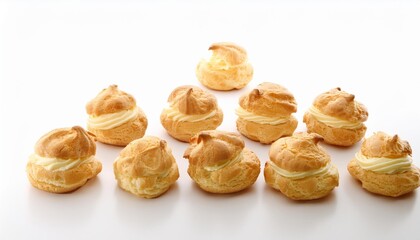 Canvas Print - multiple cream puffs placed on a white background