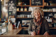 © fahrwasser - Confident senior woman in her bakery or coffee shop