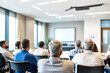 © Rysak - Business People Attentively Listening To A Presentation In A Conference Room