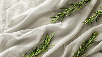 Creative Food Concept with Rosemary Sprigs Falling onto Soft Grey Linen Fabric Background for Promotional Use