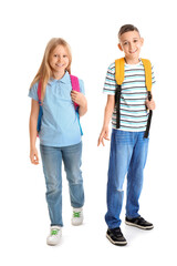 Poster - Cute pupils with backpacks on white background