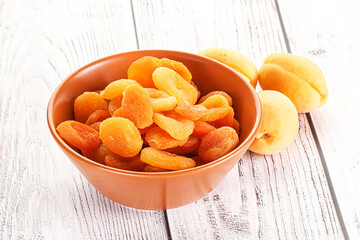 Wall Mural - Dried apricot heap in the bowl