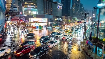 Poster - Timelapse video of busy traffic in Bangkok, Thailand in heavy rain at night