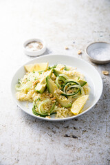 Canvas Print - Lemon couscous with avocado and cucumber