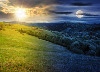 Wall Mural - composite image of countryside landscape at day and night time change concept. dramatic view of pret