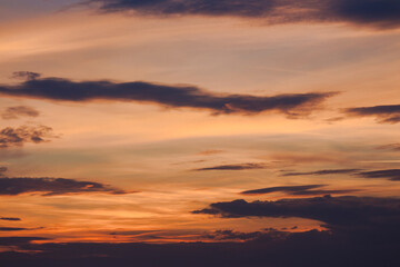 Wall Mural - dramatic cloud formations at dusk. changing weather forecast. glowing sky
