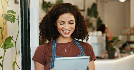 Poster - Cafe, woman and smiling with browsing tablet, employee and online inventory for website order or review. Hospitality, coffee shop and doorway for customer service, waitress and restaurant with tech