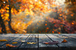 © Di Studio - empty wooden table over autumn background