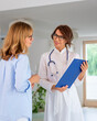 © sepy - Female doctor consulting with her patient at the clinic
