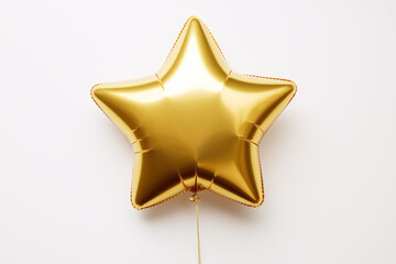 Wall Mural - Star shaped golden foil balloon on white background