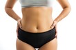 © Anna - Cropped image of sporty fat woman with fat abs in underwear Isolated on white background
