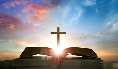 Wall Mural - open book with cross on sunset background. christian concept. 3d rendering