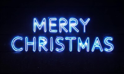 Poster - Merry Christmas is written in red neon lights. The lights are glowing and the letters are large. The image has a festive and joyful mood