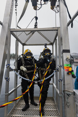 Commercial diver prepared for deep water entry