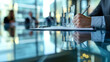 © Curioso.Photography - Businessperson writing on a clipboard in a modern office setting.