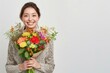 © Maki_Japan - 花束を持っている笑顔の日本人女性（母の日・結婚記念日・記念日・誕生日・デート）