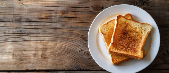 Poster - Place the toasted bread on a white plate over a wooden table with a designated copy space image