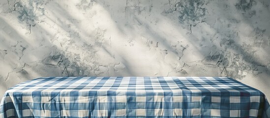 Aufkleber - Light gray textured table with a blue checkered tablecloth featuring copy space image