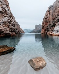 Wall Mural - semi close-up of a tranquil lake surrounded by towering mountains, more clarity with clear light and