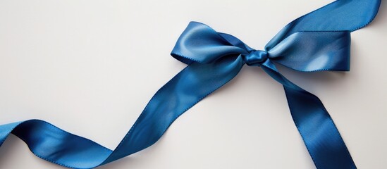 Fototapete - White backdrop with a blue ribbon on a blank card for design with a copy space image