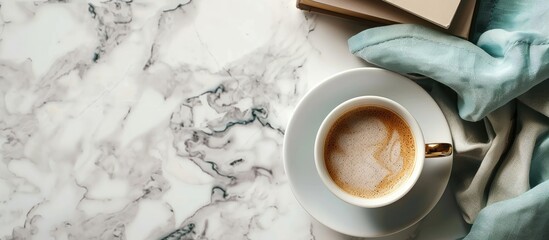 Poster - Top view of a marble table with a coffee cup and books creating a stylish setup with copy space image