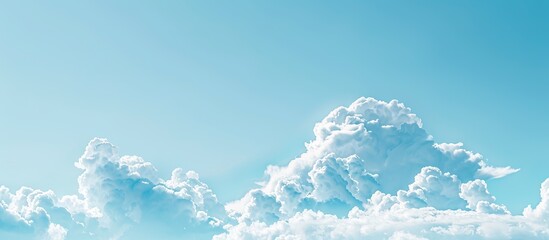 Aufkleber - White clouds in a clear blue sky with copy space image