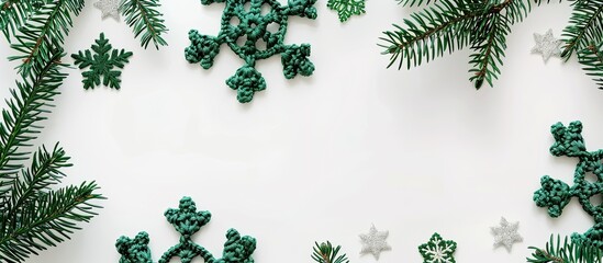 Aufkleber - Scandinavian handmade Christmas composition featuring crocheted green snowflakes and stars on a white background with a top view flat lay showcasing a copy space image