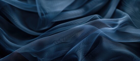 Aufkleber - Selective focus on dark blue tulle or organza fabric folds in the background creating a copy space image