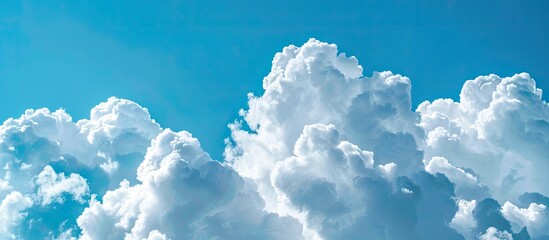 Aufkleber - White clouds in a clear blue sky with copy space image