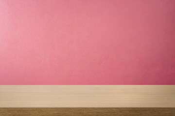 Empty wooden table top and color pink wall background for showing products and advertisers. Template mock up for display of product. product promotion in the wall. for display or montage.