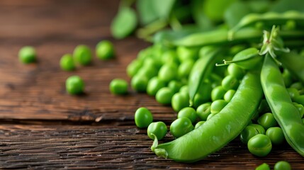 A bunch of green peas are on a wooden table. The peas are fresh and vibrant, and they are arranged in a way that makes them look like they are ready to be eaten. Concept of freshness and health