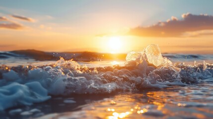 Aufkleber - The sun is setting over the ocean, casting a warm glow on the water. The waves are crashing against the shore, creating a peaceful and serene atmosphere