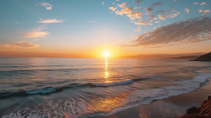 Aufkleber - The sun is setting over the ocean, casting a warm glow on the water. The sky is filled with clouds, creating a serene and peaceful atmosphere. The beach is empty