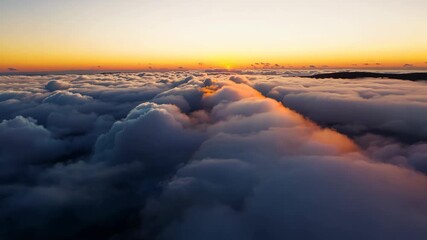 Wall Mural - Sunrise above the cloudscape, with vibrant colors