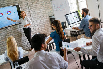 Wall Mural - group of multinational business people develop themselves in business training, meeting in office