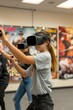 © spyrakot - Students Engaging in Virtual Martial Arts Class with VR Headsets in Equipped Classroom for Immersive Learning