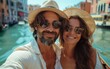 © imagineRbc - A joyful family poses for a selfie on a charming bridge, surrounded by scenic canals and vibrant buildings under a bright blue sky