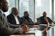 © rsimona - Diverse group of black business professionals in a modern conference room