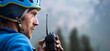 © Zhanna - A mountain rescuer, man with a walkie-talkie.