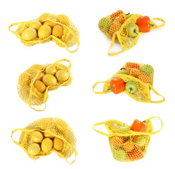 Wall Mural - Set of different string bags with fruits and vegetables isolated on white