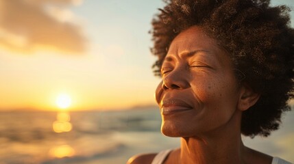 A woman lying down with her eyes closed, enjoying the sun and sea on a peaceful beach