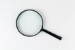 © lovapixels - magnifying glass isolated on white background