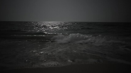 Wall Mural - moonlight reflection on sea shallow surface persian gulf the night hazy landscape in iran ocean beac
