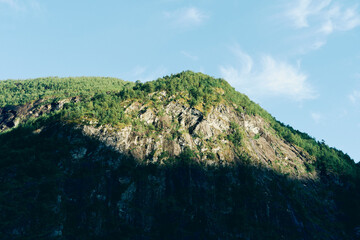 Wall Mural - Light on a mountain by Skjolden in Norway.