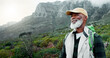 © peopleimages.com - Thinking, mountain or senior black man hiking in nature adventure or journey in woods or outdoor travel. View, forest and person on trail walking for holiday, break or trekking to explore in France
