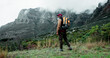 © peopleimages.com - Senior, mountain or black man hiking in nature adventure or journey in woods or outdoor travel. View, forest and person thinking on trail walking for holiday, break or trekking to explore in France