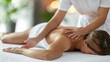 © ksu_ok - A serene spa scene featuring a woman receiving a relaxing massage on a comfortable table, set in a tranquil environment with soft lighting and soothing decor.