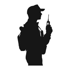 silhouette of a man with a backpack and a walkie talkie.