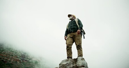 Canvas Print - View, hiking and senior man with mountains, fog and adventure with backpack, retirement and nature. Outdoor, hiker and black person with journey, explore and recreation with mockup space or low angle